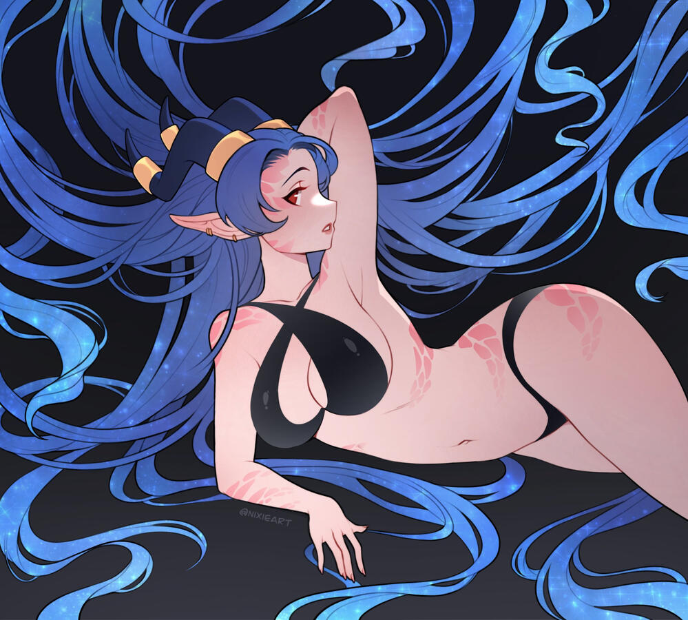 Drakania posing for her centerfold in Dragon Monthly. (There is also an uncensored version not posted here.)